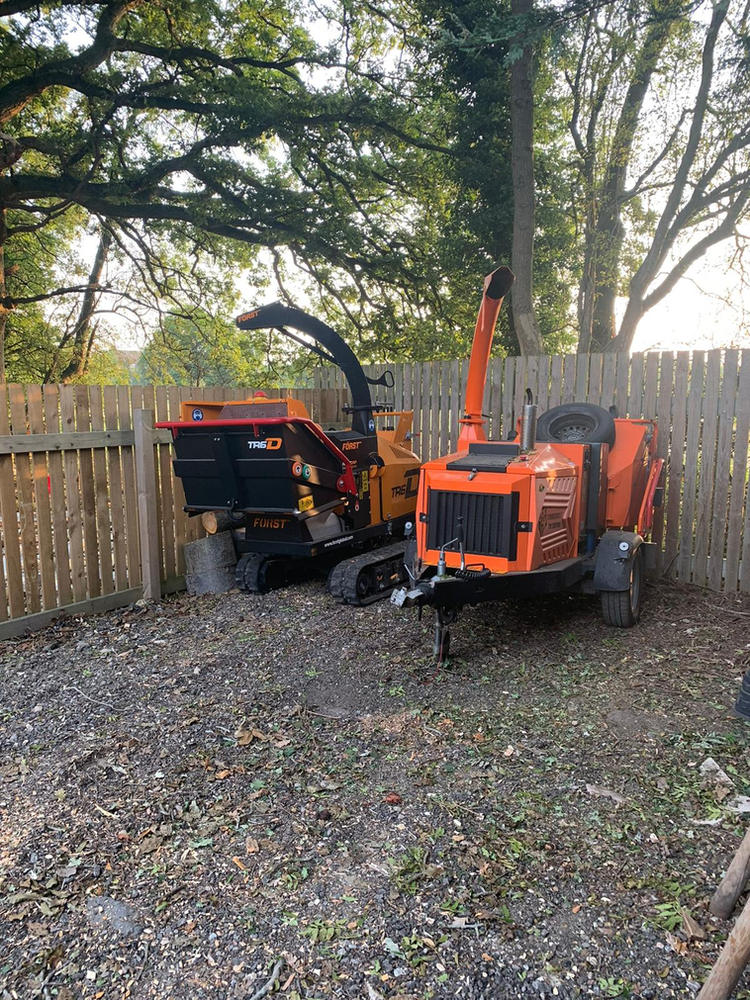 Two woodchippers parked side by side at the ADF yard